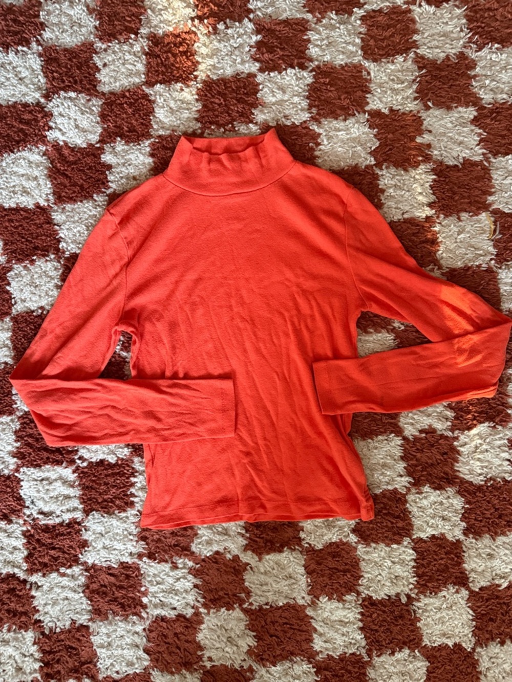 Orange turtleneck